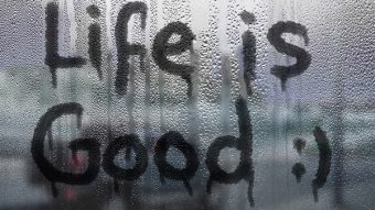 The Text on the Wet Sweaty Window